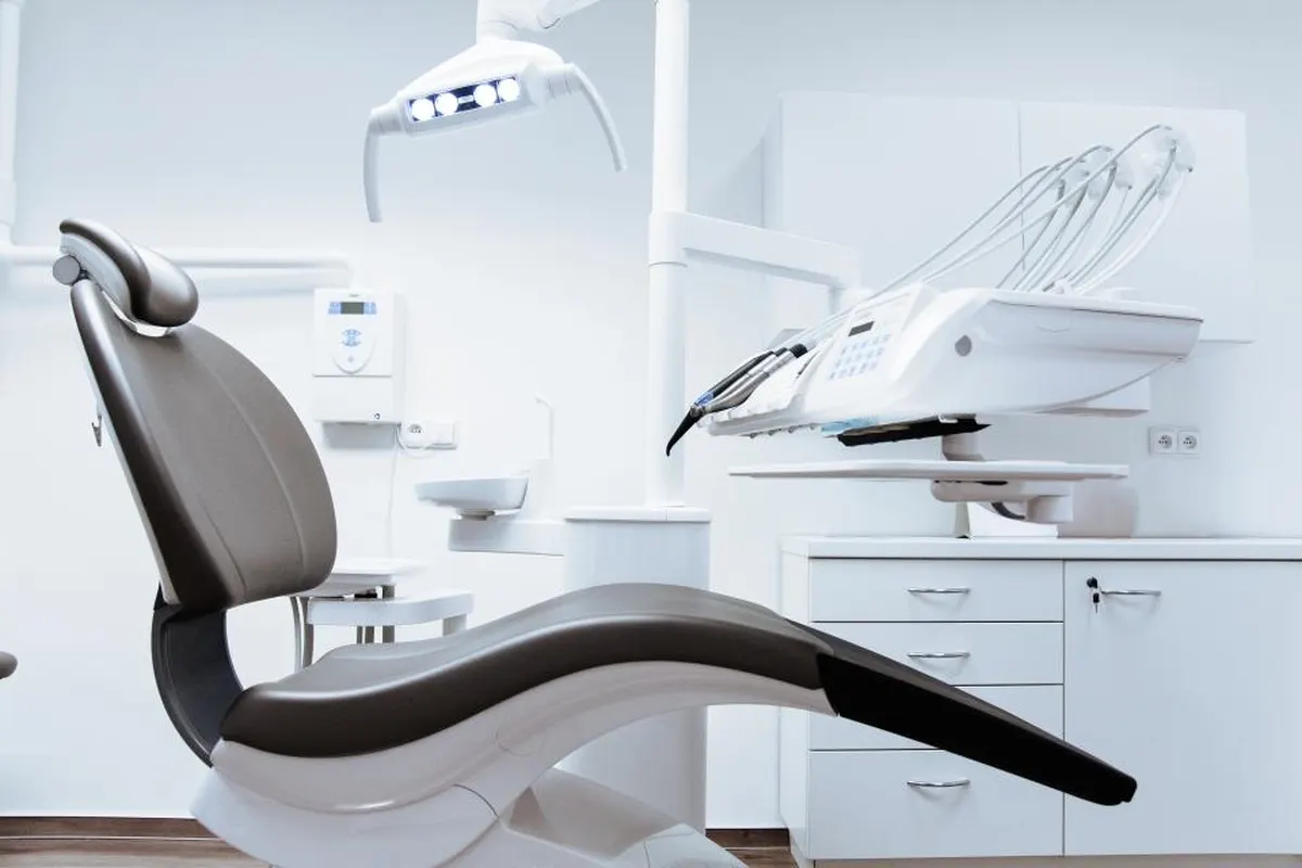 dental chair beside a bright window