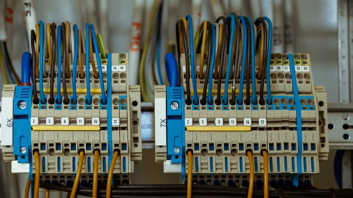 rows of DIN rail circuit breakers