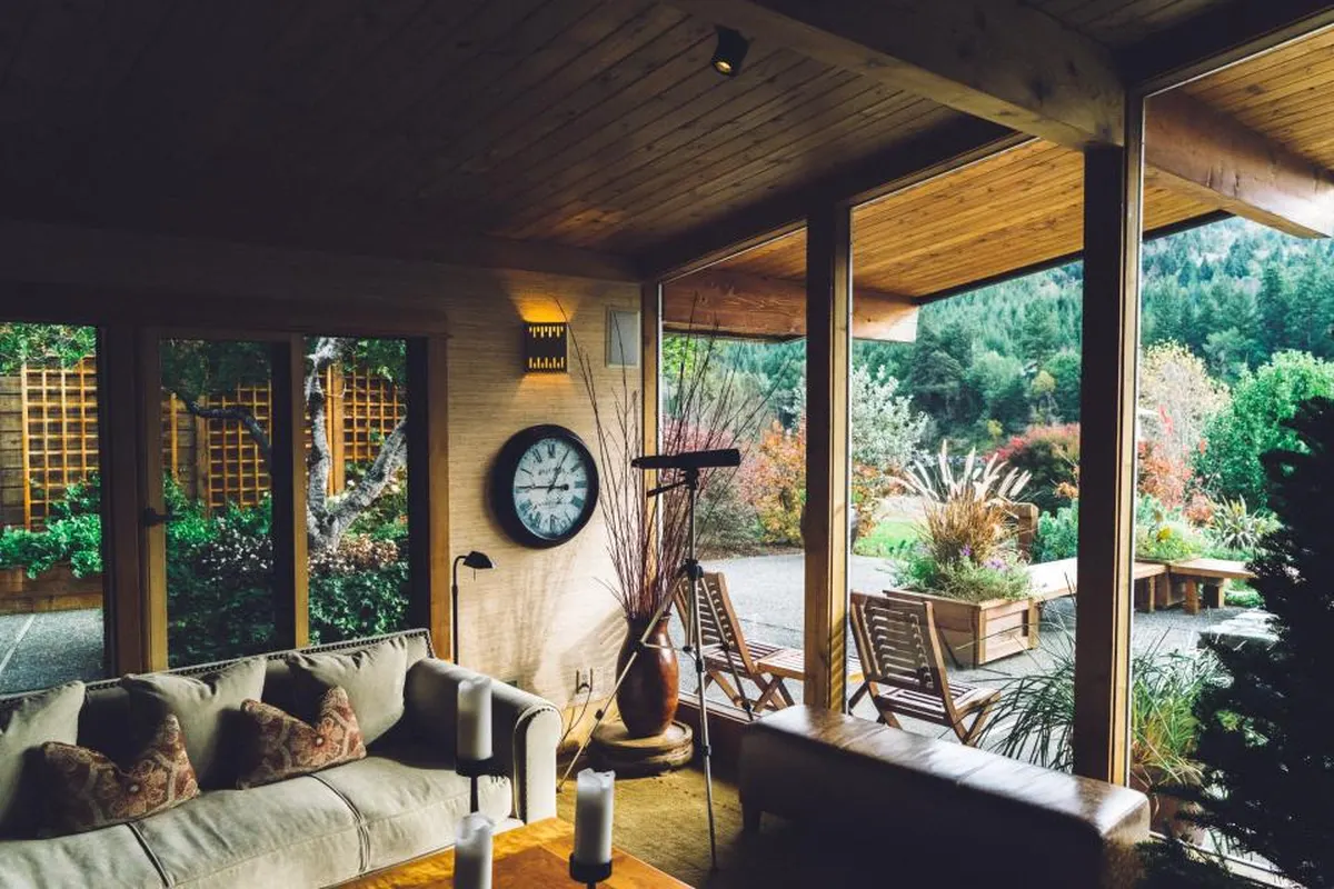 covered porch with seating and garden view